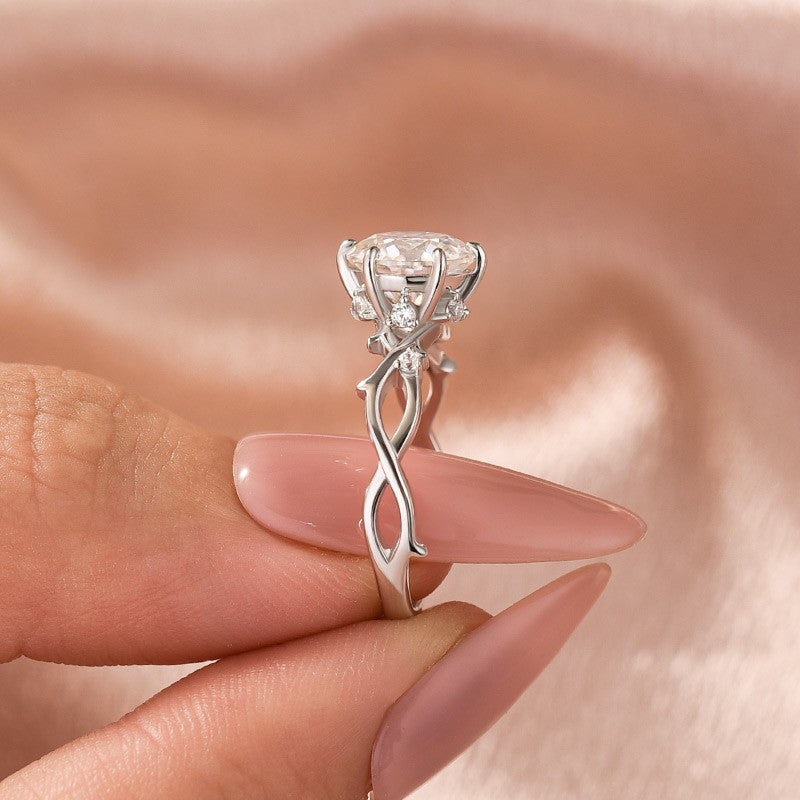 Aurevyn Moissanite 2.0 Ct Twig 6 Prong Round Cut Twist White Gold Engagement Ring