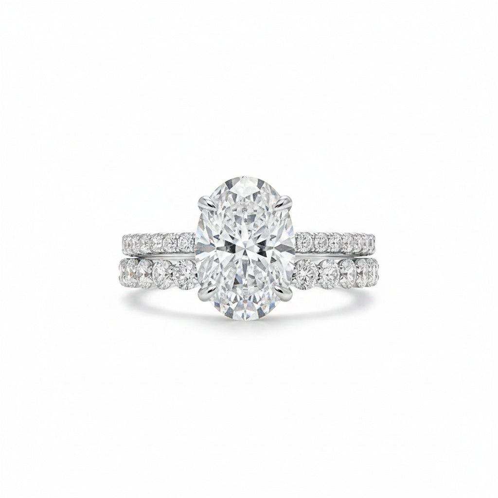 Aurevyn Moissanite 4.0Ct Hidden Halo Oval Cut White Gold Engagement Ring with 3.0Ct Oval Cut Wedding Band