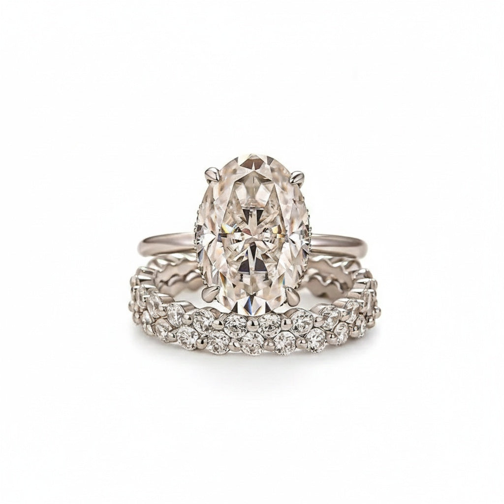 Aurevyn Moissanite 5.5Ct Hidden Halo Oval Cut Engagement Ring with 1.5 Ct Round Cut Yellow Gold Anniversary Ring