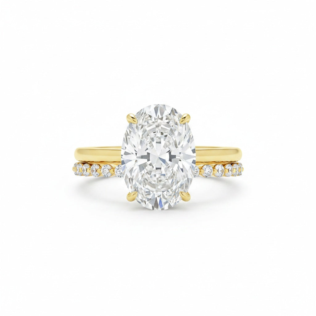 Aurevyn Solitaire 5.5Ct Oval Cut Yellow Gold Moissanite Wedding Ring Set With Round Cut Wedding Band
