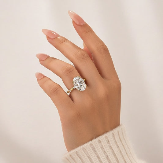 Aurevyn Yellow Gold 5.5 Ct Oval Cut Moissanite Engagement Ring In Sterling Silver
