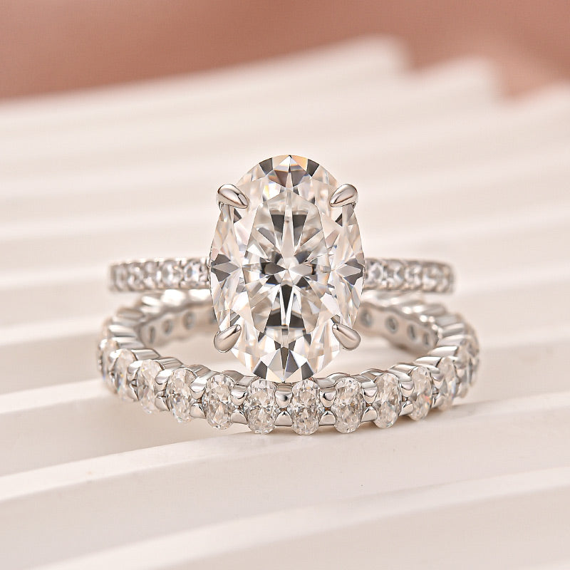 Aurevyn Moissanite 4.0Ct Hidden Halo Oval Cut White Gold Engagement Ring with 3.0Ct Oval Cut Wedding Band