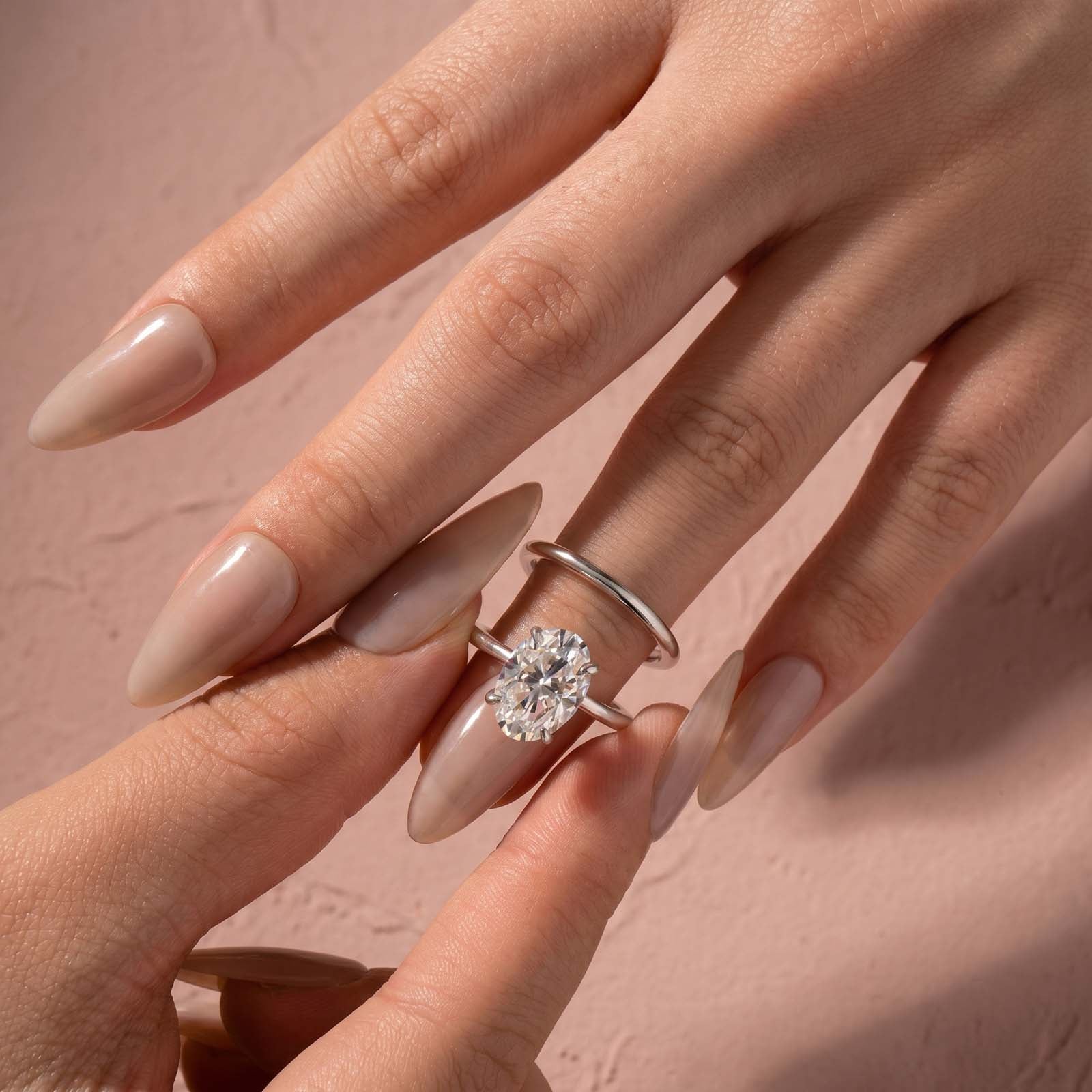 Aurevyn 4.0Ct Solitaire Oval Cut White Gold Engagement Ring with Plain Wedding Band