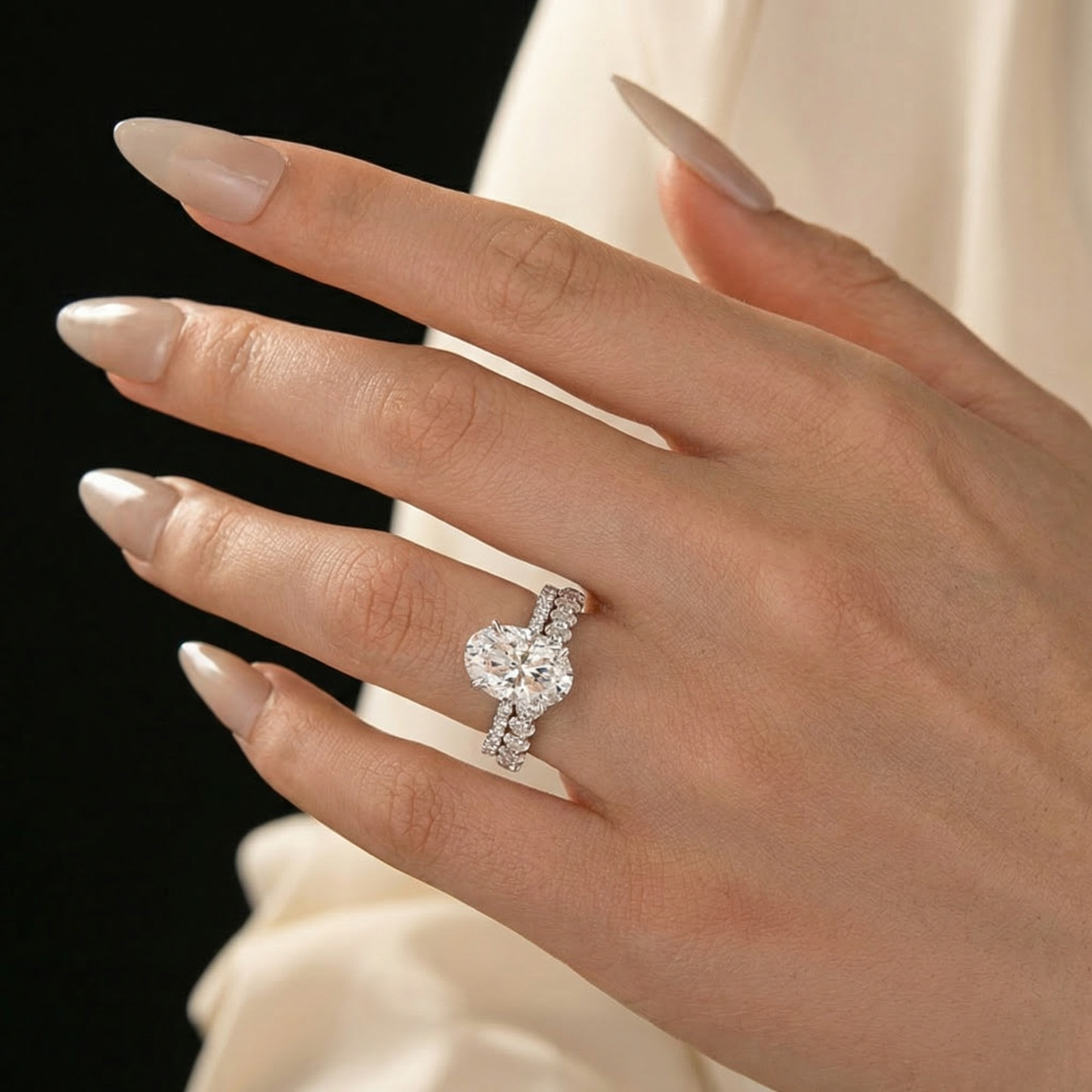 Aurevyn Moissanite 4.0Ct Hidden Halo Oval Cut White Gold Engagement Ring with 3.0Ct Oval Cut Wedding Band
