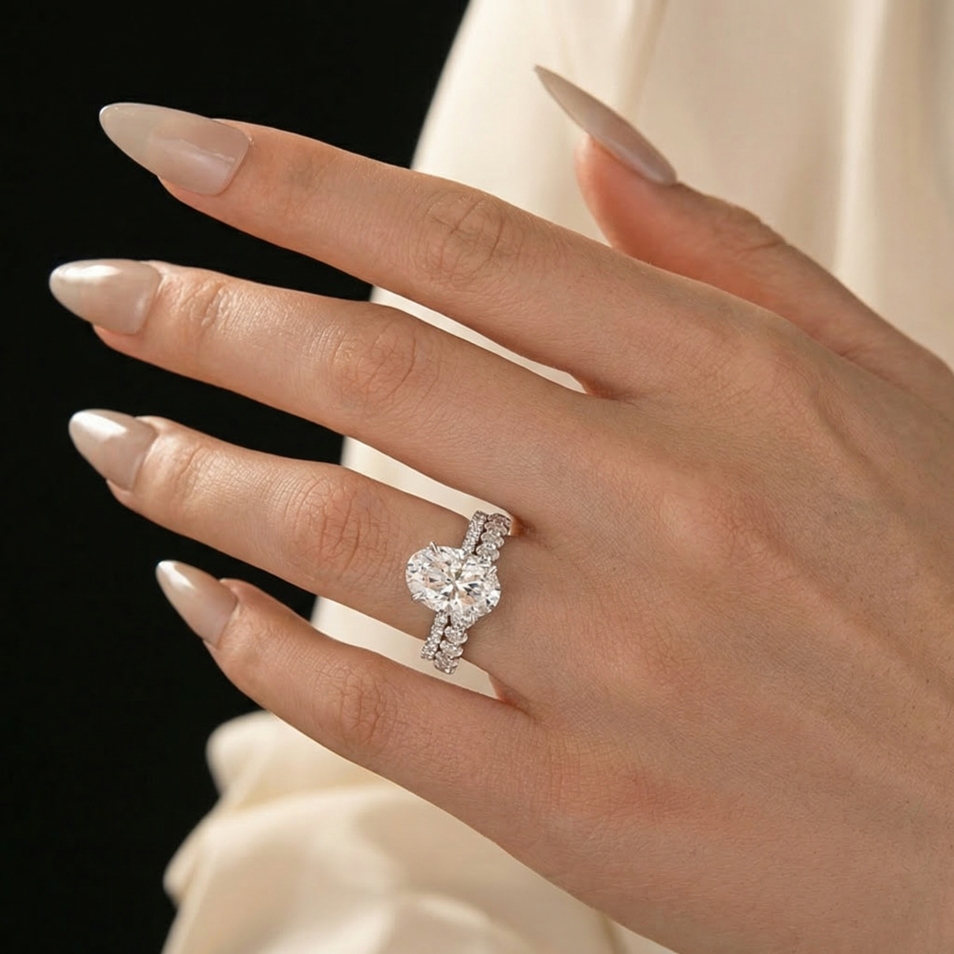 Aurevyn Moissanite 4.0Ct Hidden Halo Oval Cut White Gold Engagement Ring with 3.0Ct Oval Cut Wedding Band