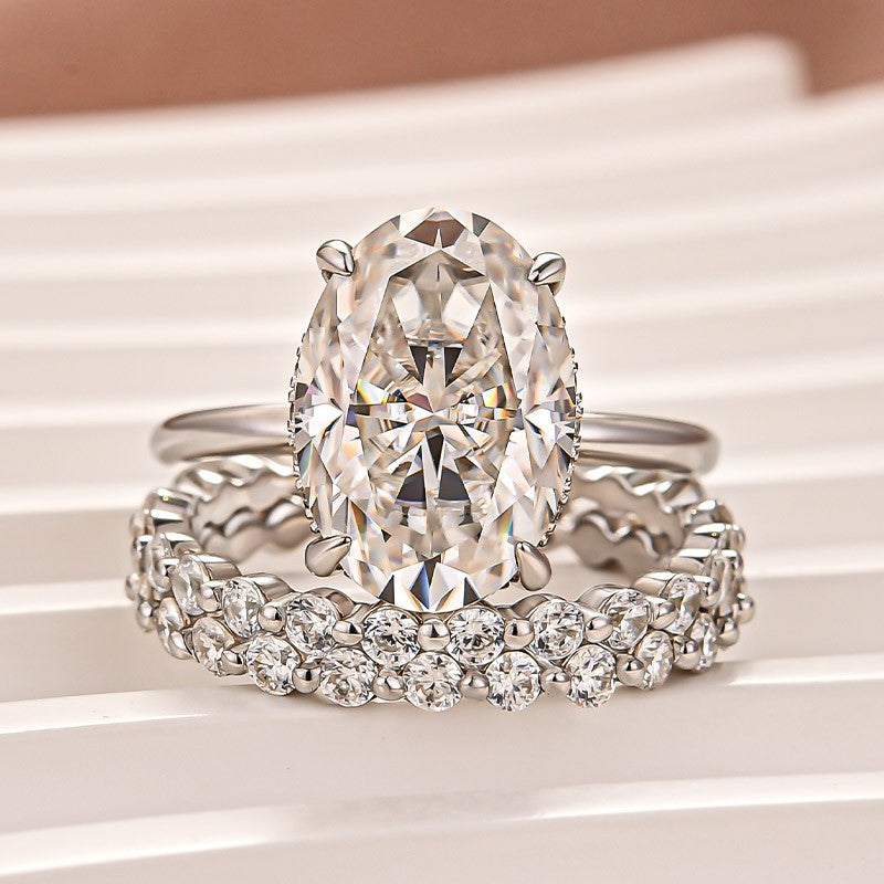 Aurevyn Moissanite 5.5Ct Hidden Halo Oval Cut Engagement Ring with 1.5 Ct Round Cut Yellow Gold Anniversary Ring