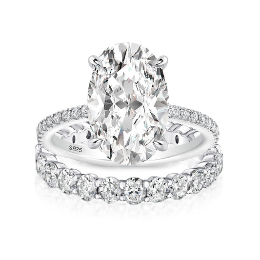 Aurevyn Moissanite 4.0Ct Hidden Halo Oval Cut White Gold Engagement Ring with 3.0Ct Oval Cut Wedding Band