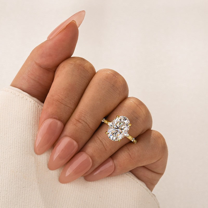 Aurevyn Yellow Gold 5.5 Ct Oval Cut Moissanite Engagement Ring In Sterling Silver