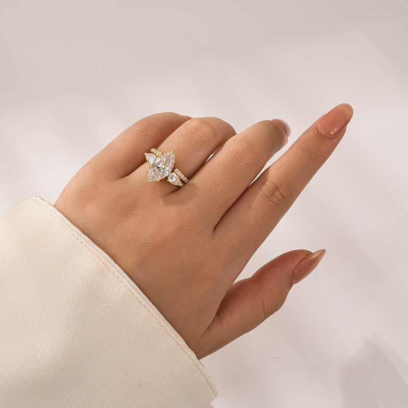 Aurevyn Moissanite 4.0Ct Marquise Cut Yellow Gold Wedding Ring with Open Pear Cut Enhancer Ring