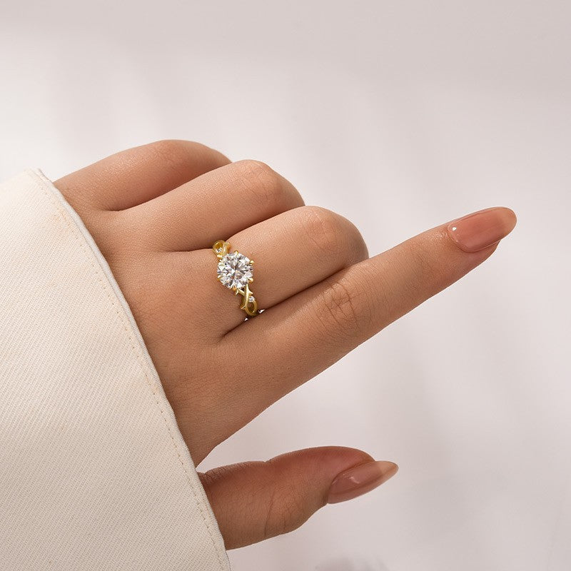 Aurevyn Moissanite 2.0 Ct Twig 6 Prong Round Cut Twist Yellow Gold Engagement Ring