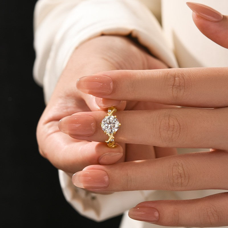 Aurevyn Moissanite 2.0 Ct Twig 6 Prong Round Cut Twist Yellow Gold Engagement Ring