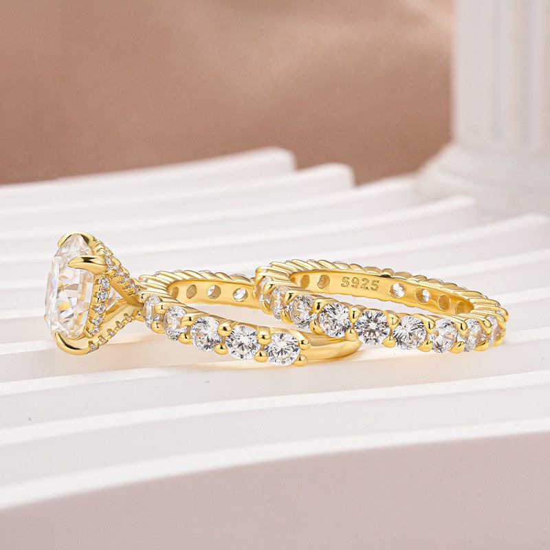 Aurevyn Moissanite 4.0Ct Round Cu/Oval Cut Side Stone Yellow Gold Travel Bridal Set
