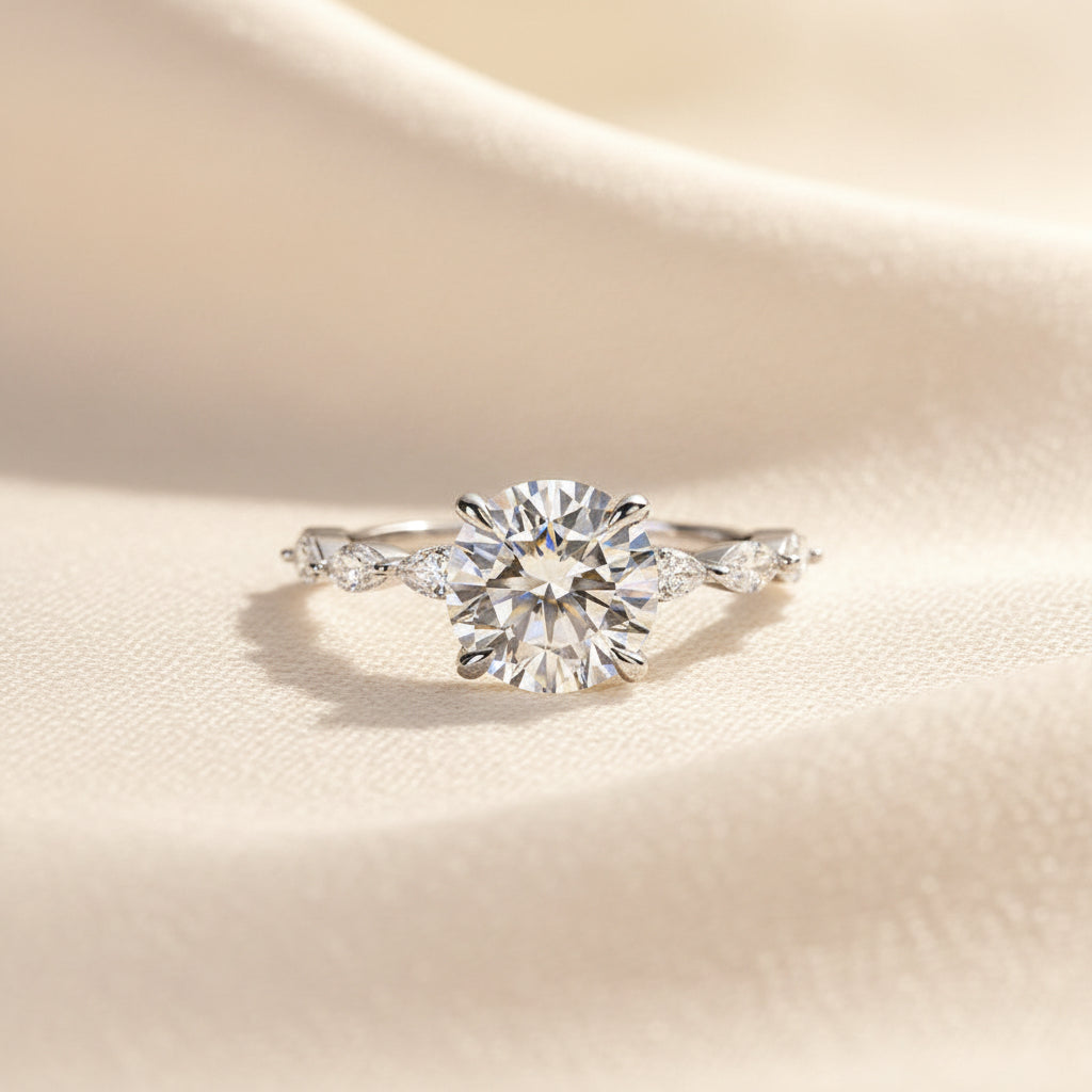 Aurevyn 2.0 Ct Round Cut with Marquise Side Stones Hidden Halo Engagement Ring