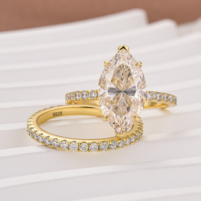 Aurevyn Moissanite 4.0 Ct Marquise Cut Yellow Gold Half-Coverage Wedding Set