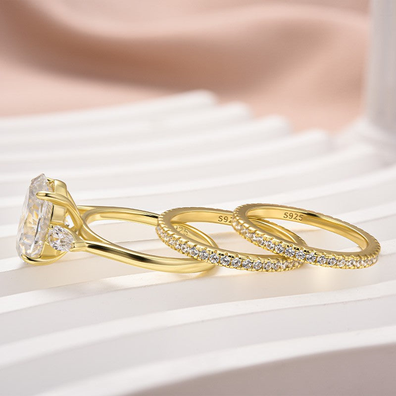 Aurevyn Moissanite 4.0Ct Oval Cut Side Stone Yellow Gold With Pavé Wedding Ring