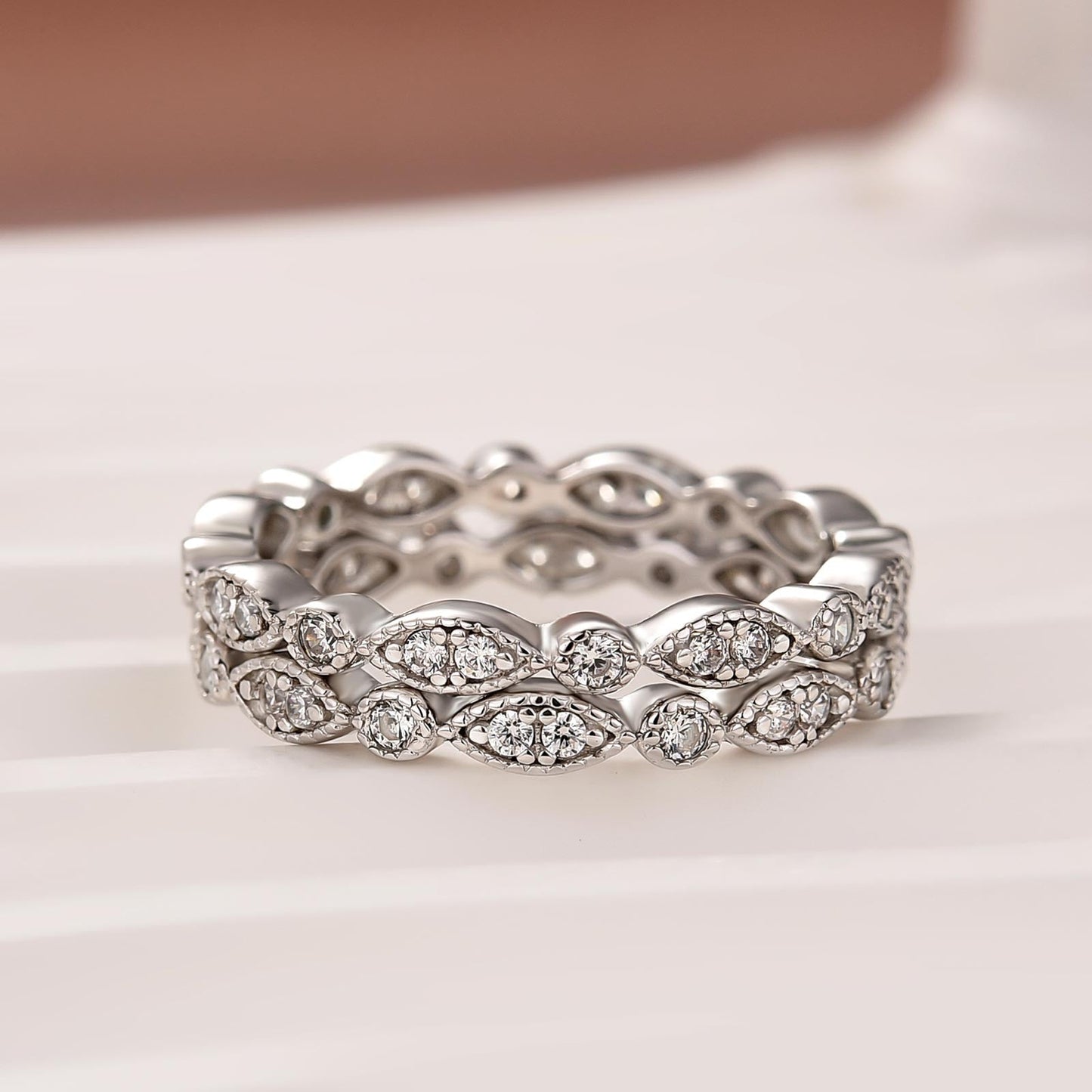 Aurevyn 0.6Ct Moissanite with Matching Pave Eternity Band in White Gold