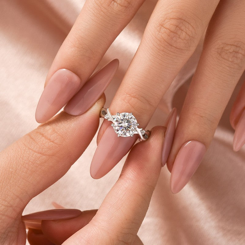 Aurevyn Moissanite 2.0 Ct Twig 6 Prong Round Cut Twist White Gold Engagement Ring