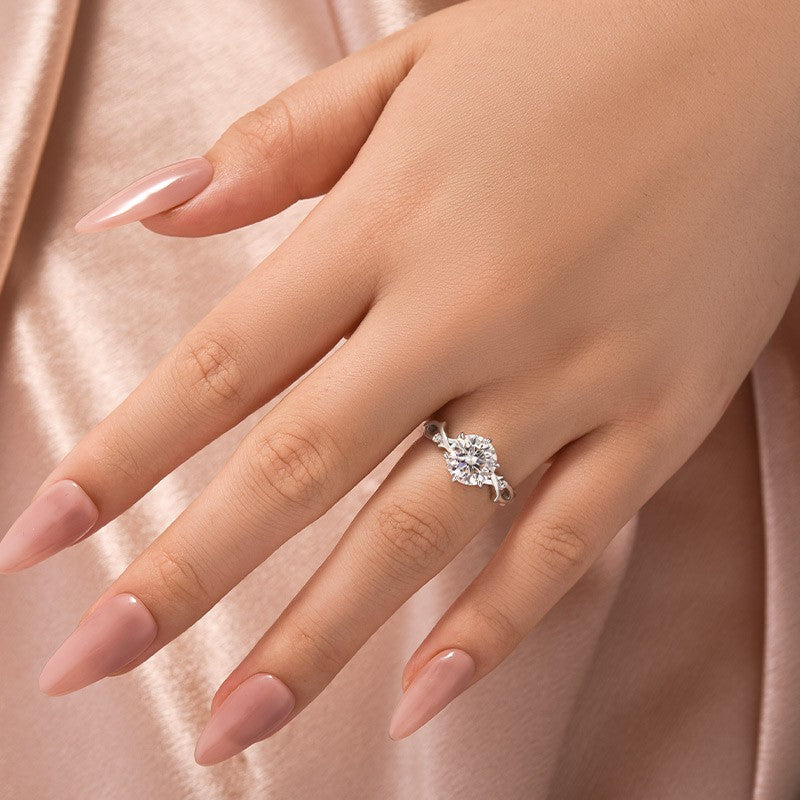 Aurevyn Moissanite 2.0 Ct Twig 6 Prong Round Cut Twist White Gold Engagement Ring
