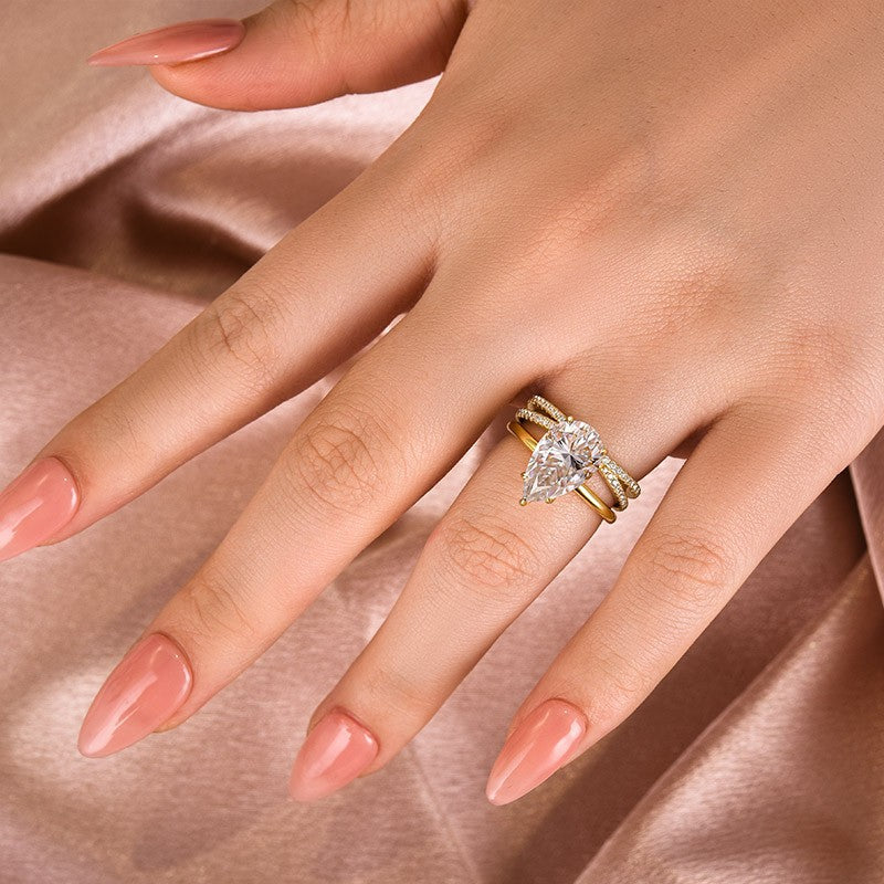 Aurevyn Moissanite 4.0 Ct Pear Cut Yellow Gold Wedding Ring With X Criss Cross Wedding Band