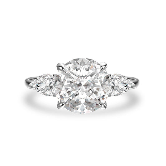 Aurevyn Moissanite 4.0 Ct Round Cut White Gold Engagement Ring with Pear Cut Side Stone