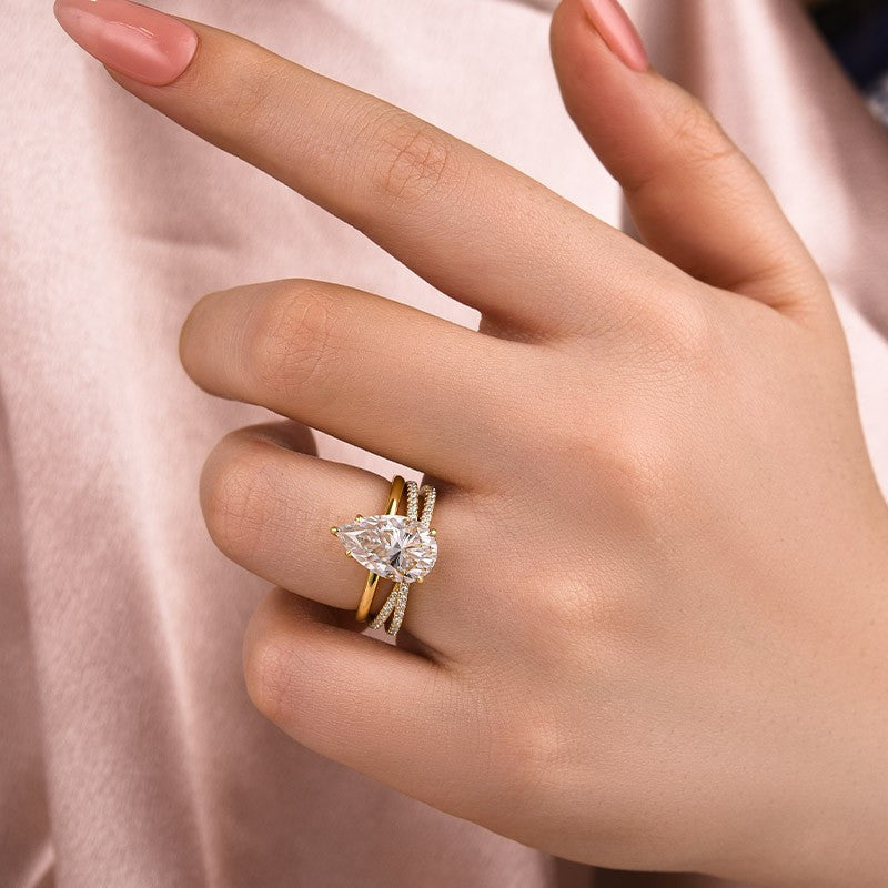 Aurevyn Moissanite 4.0 Ct Pear Cut Yellow Gold Wedding Ring With X Criss Cross Wedding Band