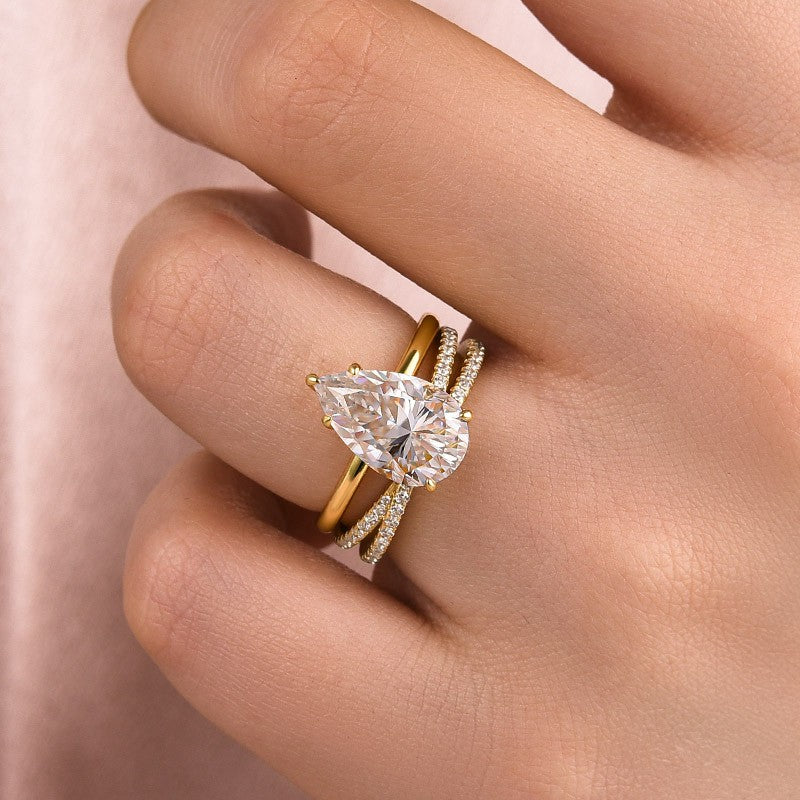 Aurevyn Moissanite 4.0 Ct Pear Cut Yellow Gold Wedding Ring With X Criss Cross Wedding Band