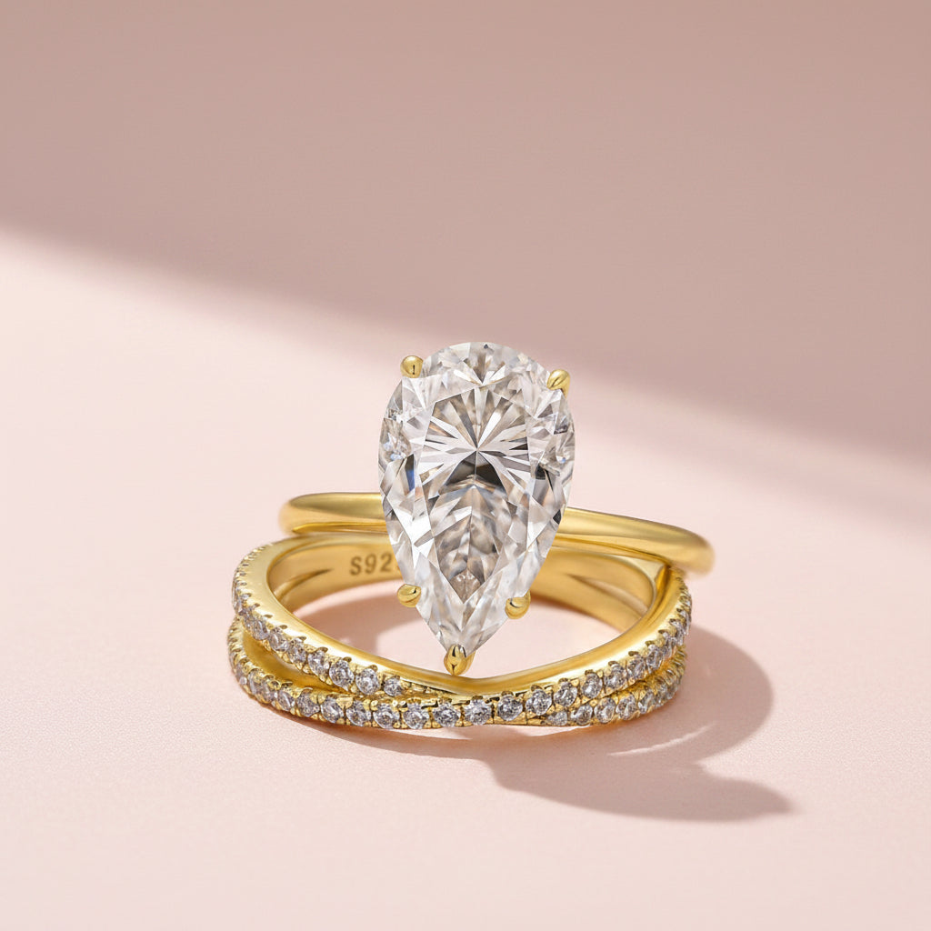 Aurevyn Moissanite 4.0 Ct Pear Cut Yellow Gold Wedding Ring With X Criss Cross Wedding Band