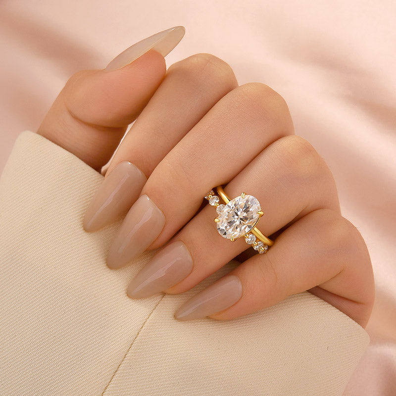 Aurevyn Moissanite 4.0Ct Hidden Halo Oval Cut Yellow Gold Engagement Ring with 1.5Ct Round Cut Wedding Band