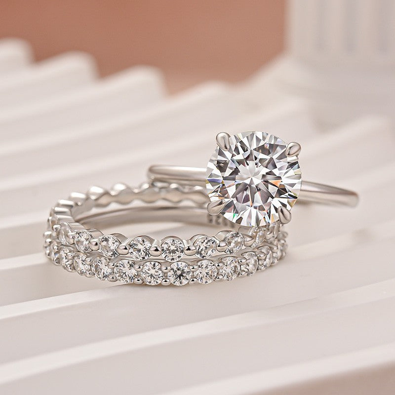 Aurevyn Moissanite Solitaire 2.0 Ct Round Cut White Gold Engagement Ring with Round & Marquise Accents Bands