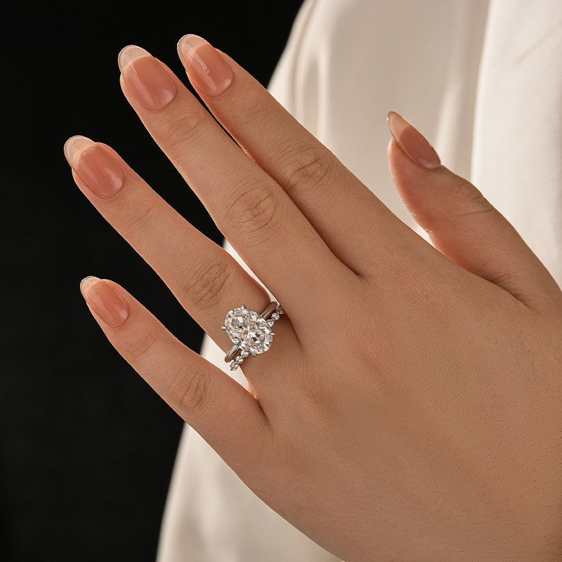 Aurevyn Solitaire 5.5Ct Oval Cut White Gold Moissanite Wedding Ring Set With Round Cut Wedding Band