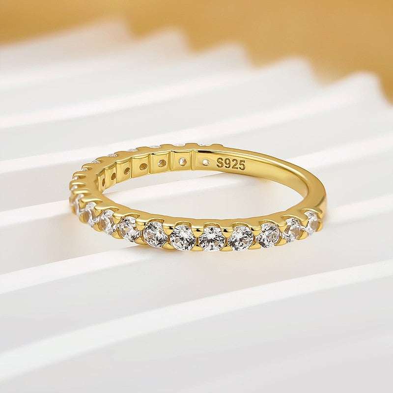Aurevyn Moissanite 0.6Ct Classic Round Cut Half Yellow Gold Wedding Band In Sterling Silver
