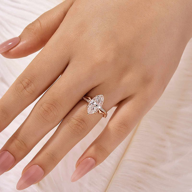 Aurevyn Moissanite 3.0Ct Marquise Cut Rose Gold Twist Engagement Ring In Sterling Silver