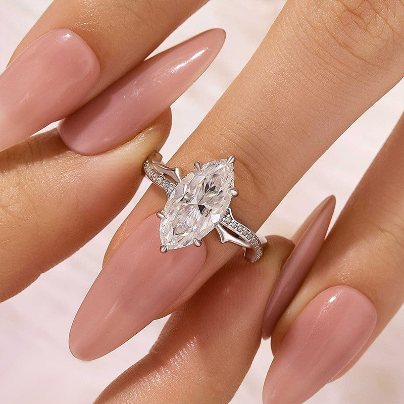 Aurevyn Moissanite 3.0Ct Marquise Cut White Gold Twist Engagement Ring In Sterling Silver