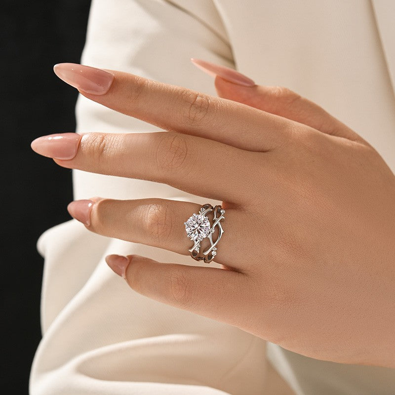 Aurevyn Moissanite 2.0 Ct Twig 6 Prong Round Cut Twist White Gold Wedding Set