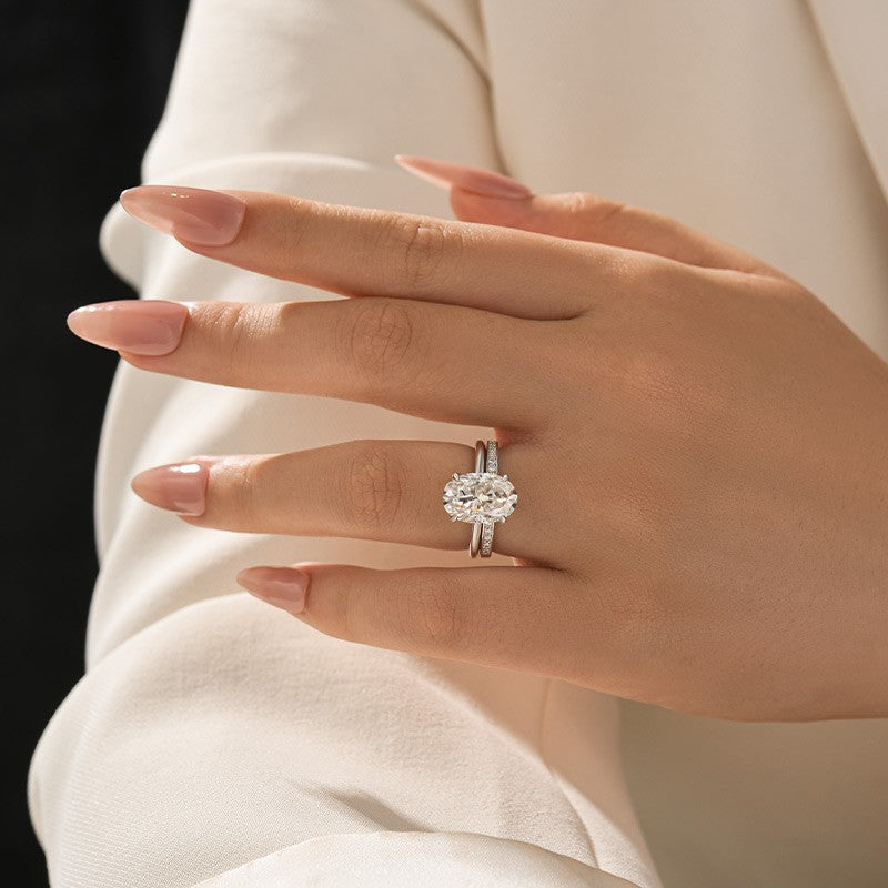 Aurevyn Moissanite 4.0Ct Solitaire Oval Cut White Gold Wedding Ring with Pavé Eternity Ring