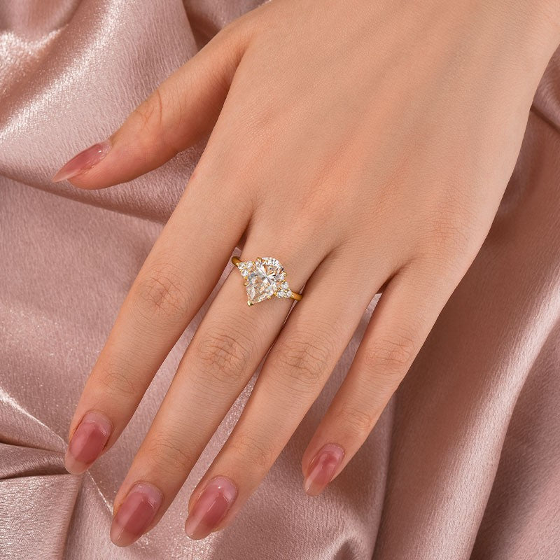 Aurevyn 3.0 Ct Pear Cut Yellow Gold Engagement Ring with Round Cut Side Stone