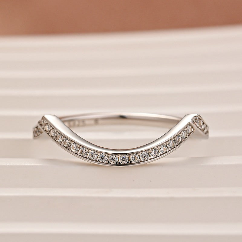 Aurevyn 0.5Ct Round Cut White Gold Curve Channel Set Wedding Band In Sterling Silver