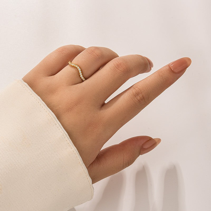 Aurevyn 1.0Ct Round Cut Yellow Gold Curve Wedding Band In Sterling Silver