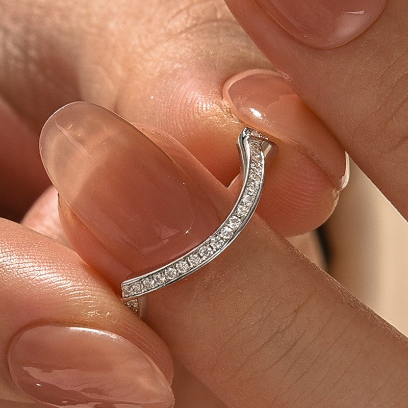 Aurevyn 0.5Ct Round Cut White Gold Curve Channel Set Wedding Band In Sterling Silver
