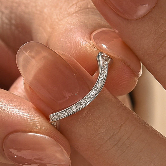 Aurevyn 0.5Ct Round Cut White Gold Curve Channel Set Wedding Band In Sterling Silver