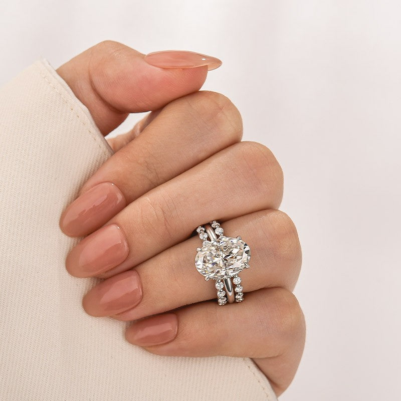 Aurevyn Moissanite 5.5Ct Hidden Halo Oval Cut Engagement Ring with 1.5 Ct Round Cut Yellow Gold Anniversary Ring