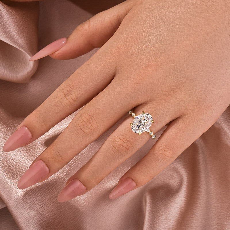 Aurevyn Moissanite 5.5Ct Oval Cut Side Stone Yellow Gold Engagement Ring