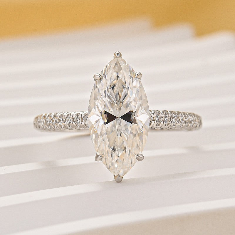 Aurevyn Moissanite 3.0Ct Marquise Cut Solitaire Engagement Ring with Pave Three-Sided Band in 18K White Gold Plated Sterling Silver