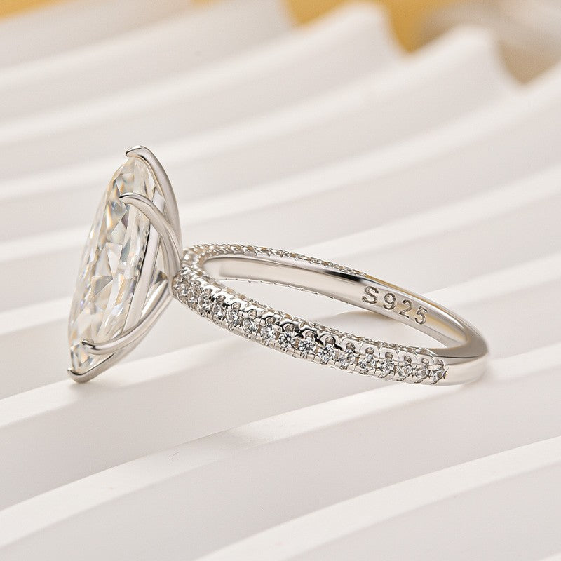 Aurevyn Moissanite 3.0Ct Marquise Cut Solitaire Engagement Ring with Pave Three-Sided Band in 18K White Gold Plated Sterling Silver
