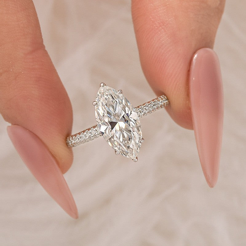 Aurevyn Moissanite 3.0Ct Marquise Cut Solitaire Engagement Ring with Pave Three-Sided Band in 18K White Gold Plated Sterling Silver