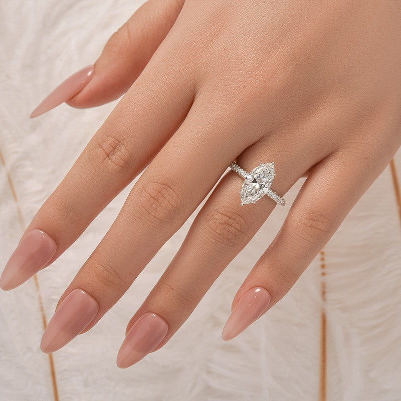 Aurevyn Moissanite 3.0Ct Marquise Cut Solitaire Engagement Ring with Pave Three-Sided Band in 18K White Gold Plated Sterling Silver