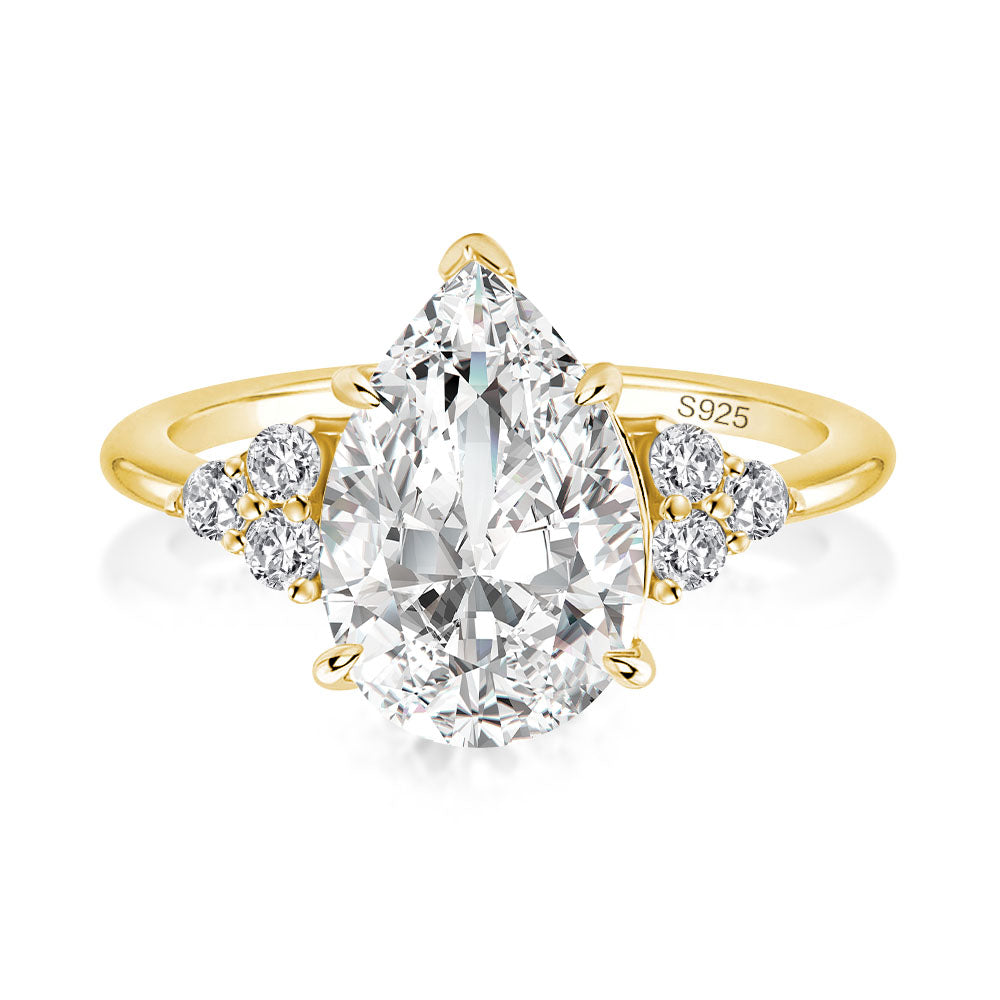 Aurevyn 3.0 Ct Pear Cut Yellow Gold Engagement Ring with Round Cut Side Stone