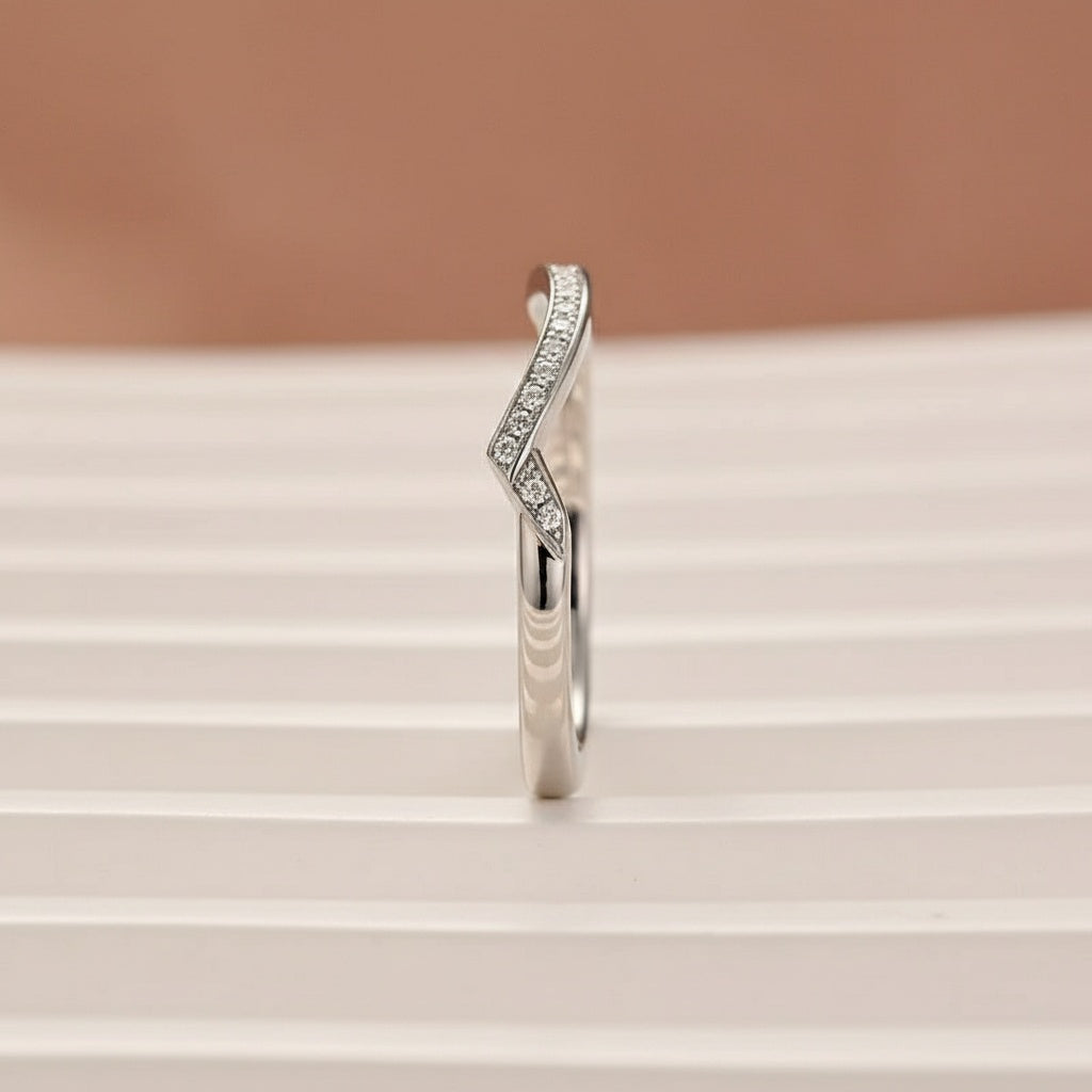 Aurevyn 0.5Ct Round Cut White Gold Curve Channel Set Wedding Band In Sterling Silver
