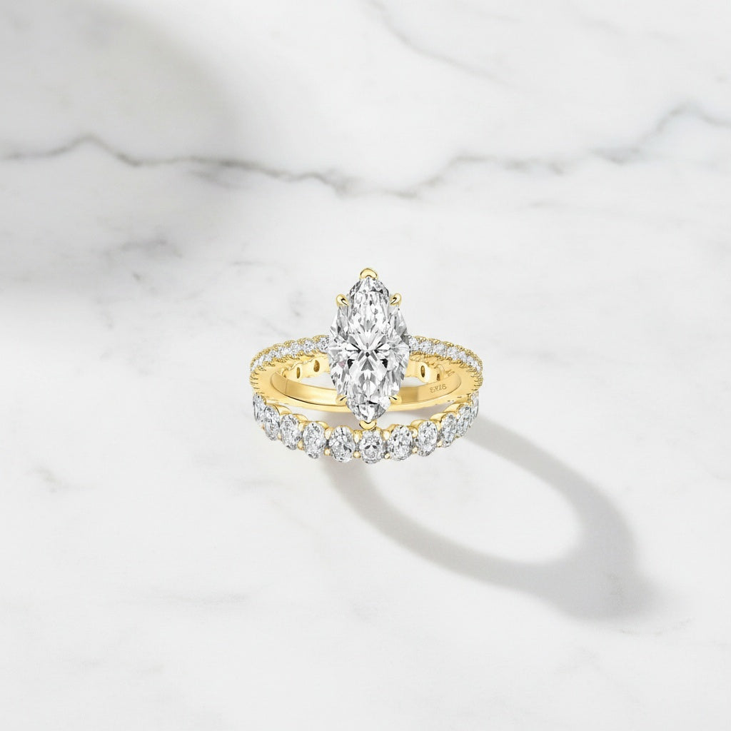 Aurevyn 2PC 4.0Ct Marquise Cut Yellow Gold Bridal Ring Set with Oval Cut Wedding Band