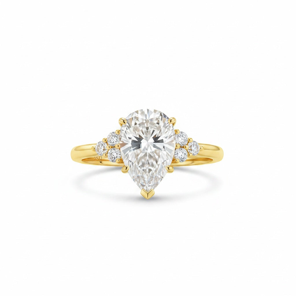 Aurevyn 3.0 Ct Pear Cut Yellow Gold Engagement Ring with Round Cut Side Stone